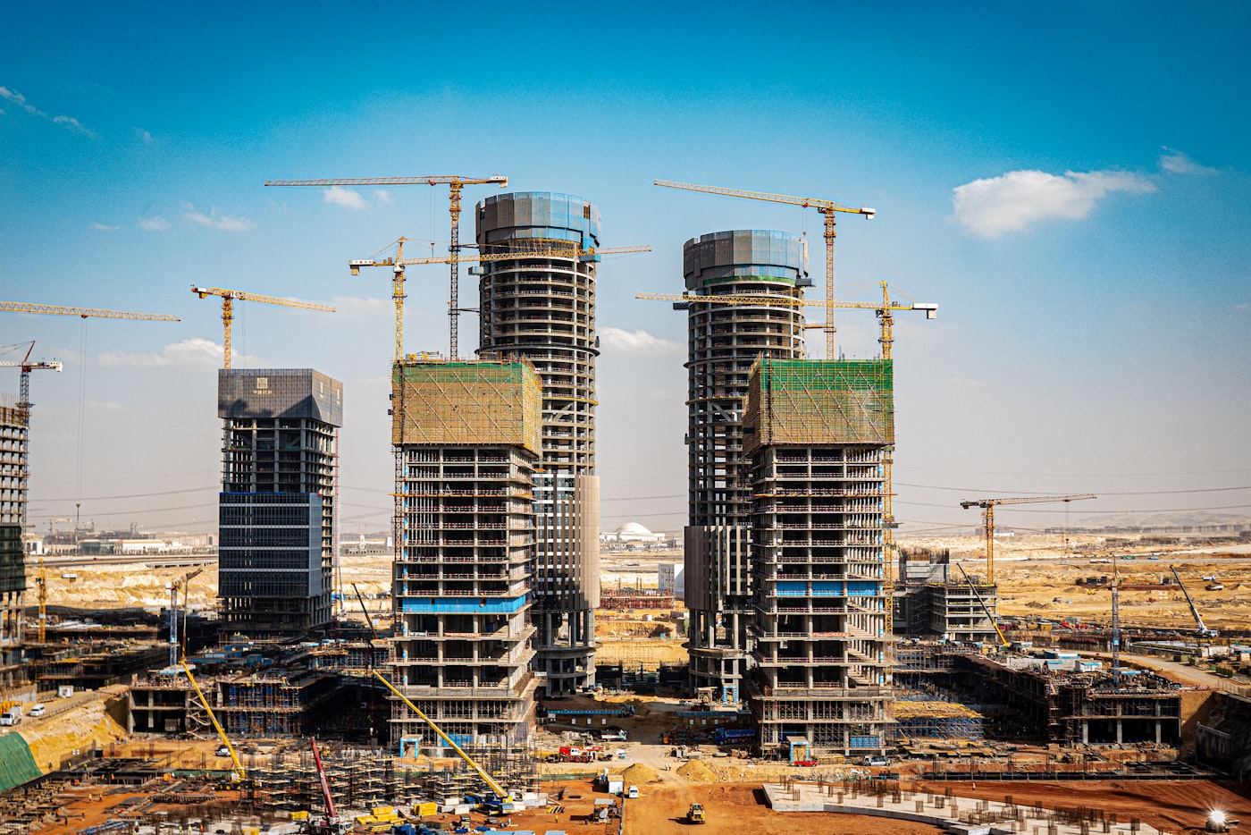 Workers and architects coordinating on a residential construction site.